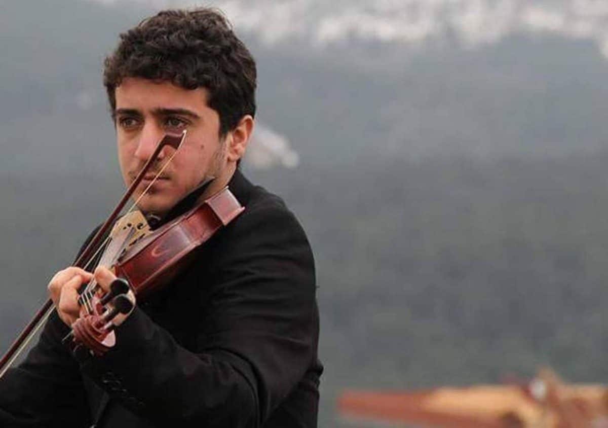 musicista curdo annegato violino