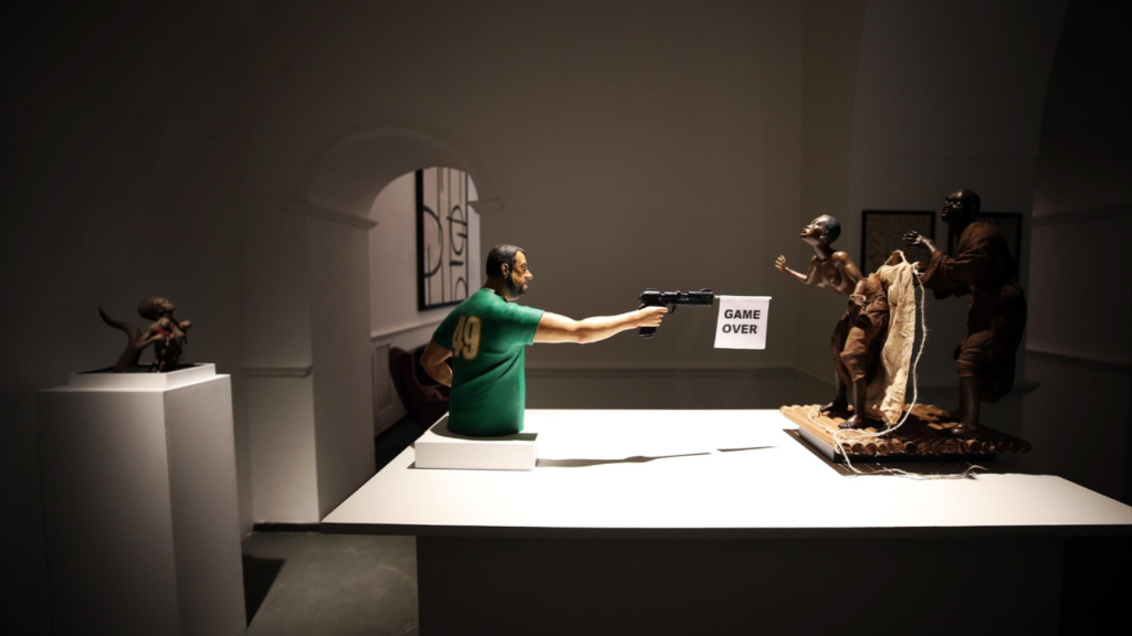 salvini spara migranti scultura